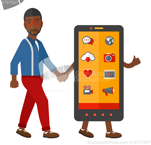 Image of Man walking with smartphone.
