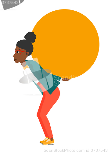 Image of Woman carrying big ball.