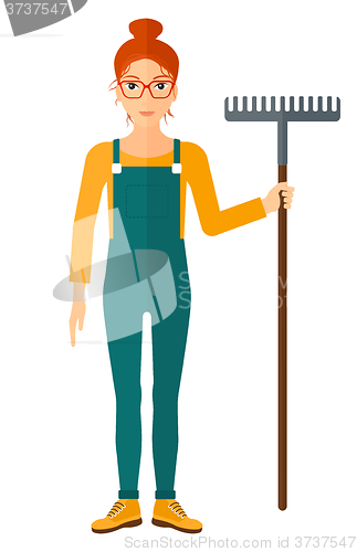 Image of Farmer with rake.