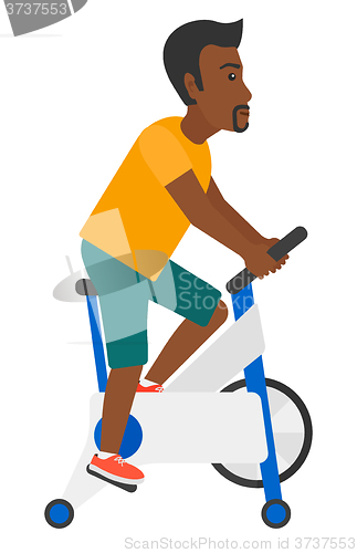 Image of Man doing cycling exercise.