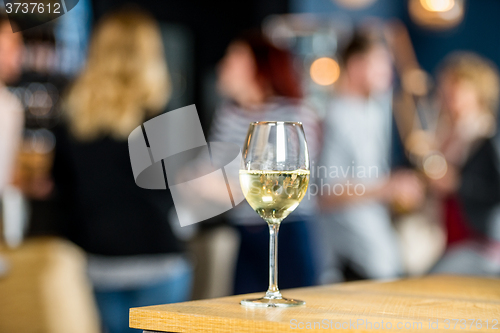 Image of Closeup Of Wineglass On Table At Bar