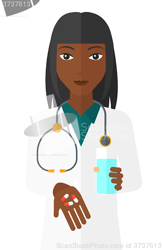 Image of Pharmacist giving pills.