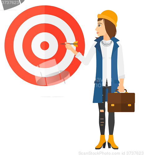 Image of Business woman with target board.