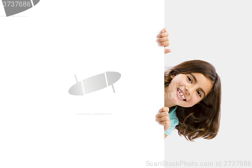 Image of Girl holding a whiteboard