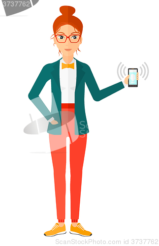 Image of Woman holding ringing telephone.