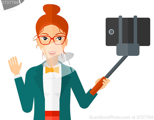 Image of Woman making selfie.