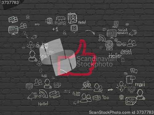 Image of Social media concept: Thumb Up on wall background