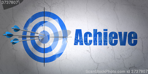 Image of Finance concept: target and Achieve on wall background