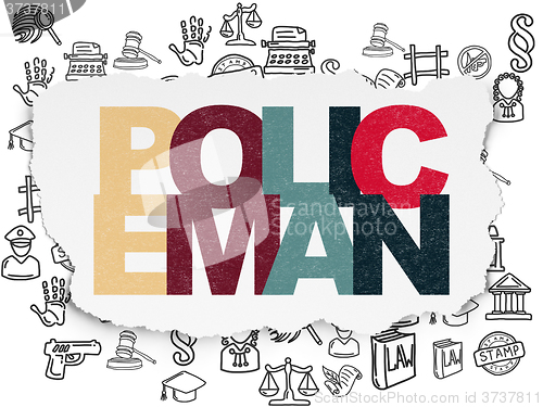 Image of Law concept: Policeman on Torn Paper background