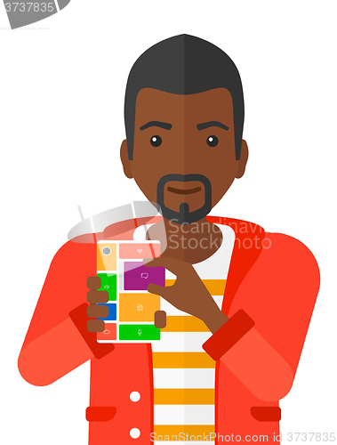 Image of Man with modular phone.