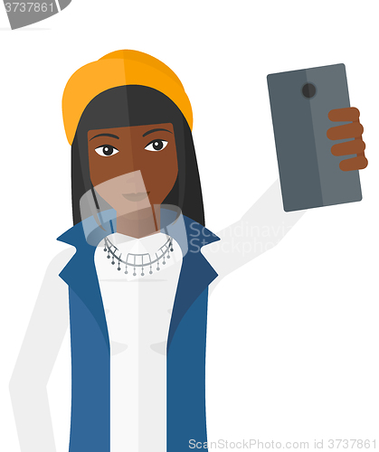 Image of Woman making selfie.