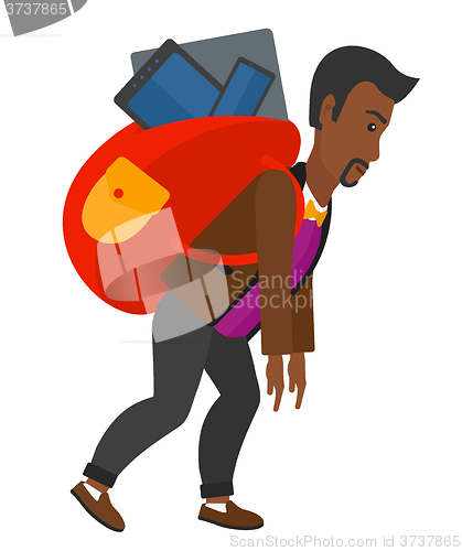 Image of Man with backpack full of devices.