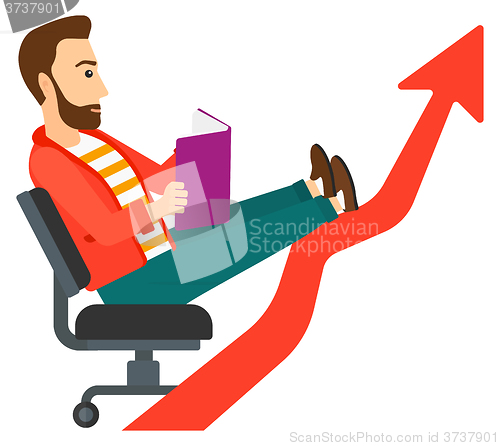 Image of Businessman reading book.