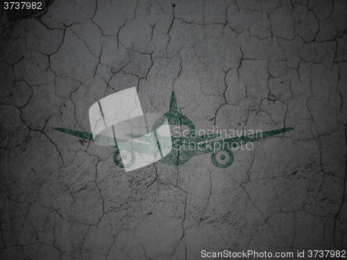 Image of Vacation concept: Aircraft on grunge wall background