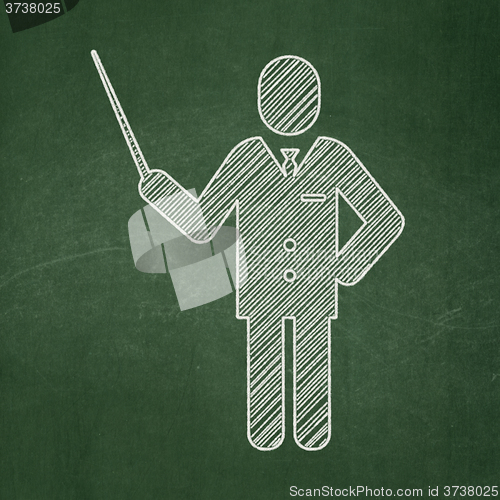 Image of Studying concept: Teacher on chalkboard background