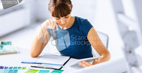 Image of woman working with color samples for selection