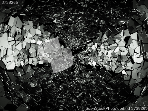 Image of Pieces of broken or cracked glass on black