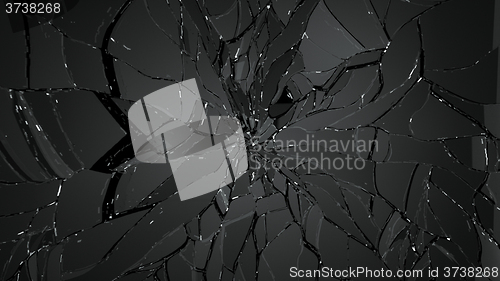 Image of Pieces of splitted or shattered glass on black