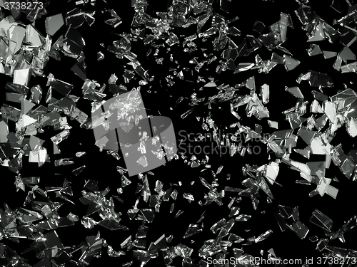 Image of Pieces of splitted or cracked glass on black