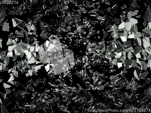 Image of Shattered pieces of glass on black