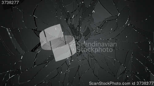 Image of Pieces of shattered glass on black