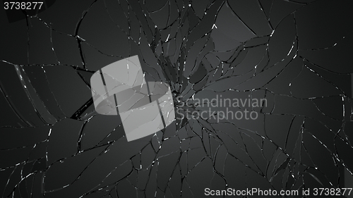 Image of Pieces of shattered glass on black