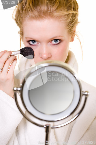 Image of Putting on makeup