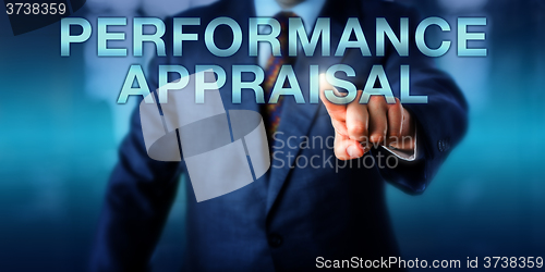 Image of Manager Touching PERFORMANCE APPRAISAL Onscreen