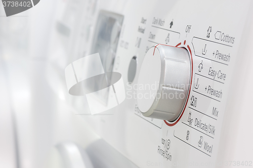 Image of washing mashines in appliance store