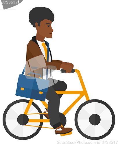 Image of Man cycling to work.