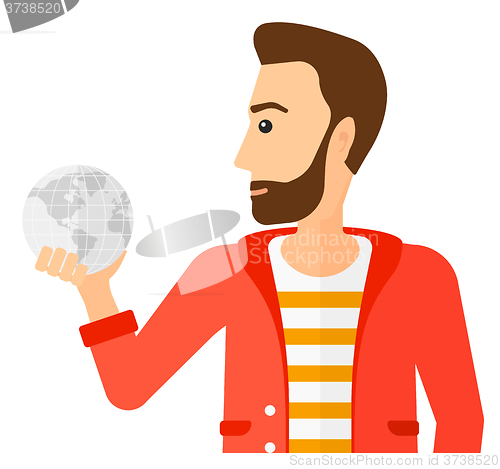 Image of Man holding globe.