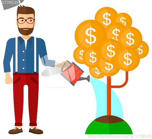 Image of Man watering money tree.