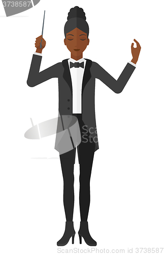 Image of Conductor directing with his baton.