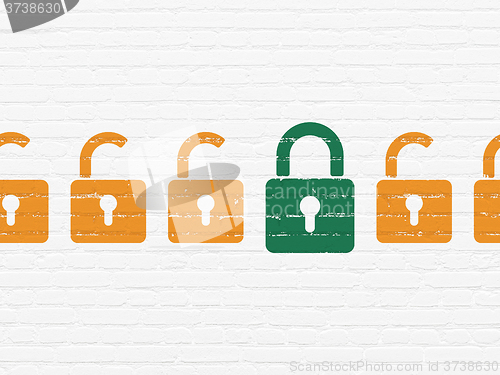 Image of Privacy concept: closed padlock icon on wall background
