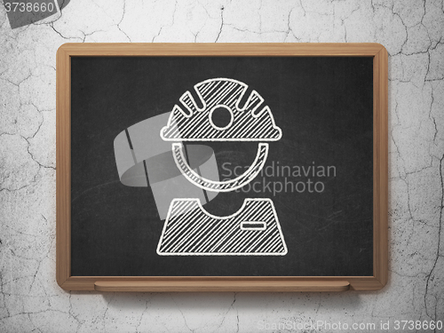 Image of Industry concept: Factory Worker on chalkboard background