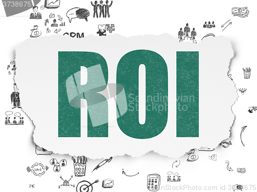 Image of Business concept: ROI on Torn Paper background