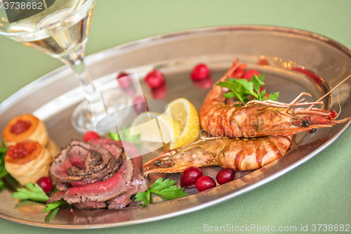 Image of Grilled shrimps and beef meat 