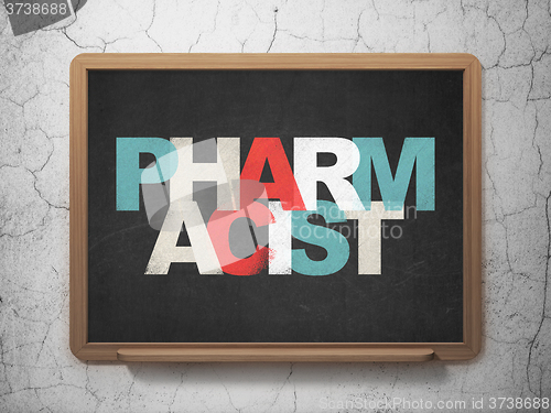 Image of Healthcare concept: Pharmacist on School Board background