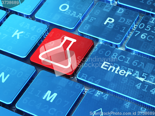 Image of Science concept: Flask on computer keyboard background