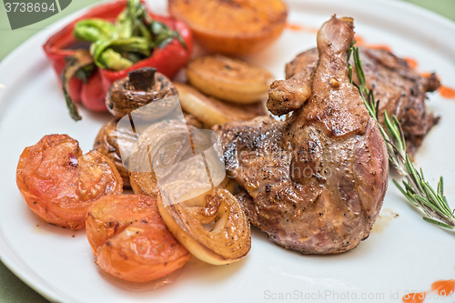 Image of grilled duck legs