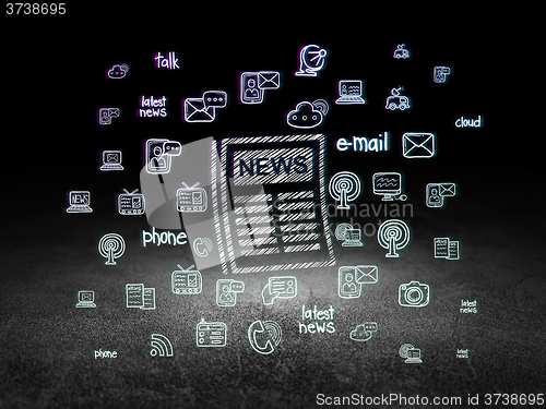 Image of News concept: Newspaper in grunge dark room