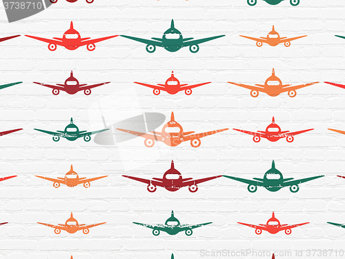 Image of Tourism concept: Aircraft icons on wall background