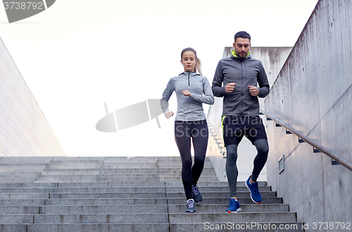 Image of couple walking downstairs on stadium