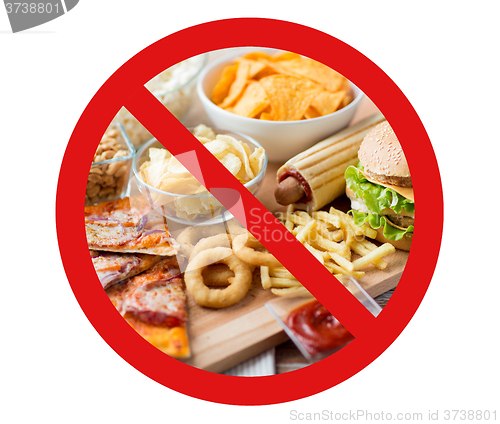 Image of close up of fast food snacks behind no symbol