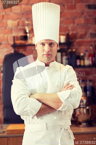 Image of happy male chef cook in restaurant kitchen