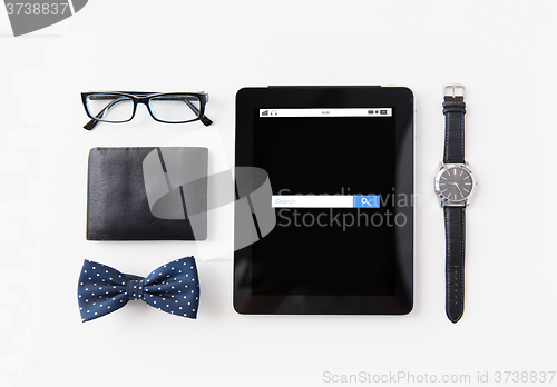 Image of tablet pc with web search bar and personal stuff