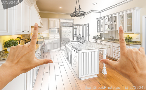 Image of Hands Framing Gradated Custom Kitchen Design Drawing and Photo C