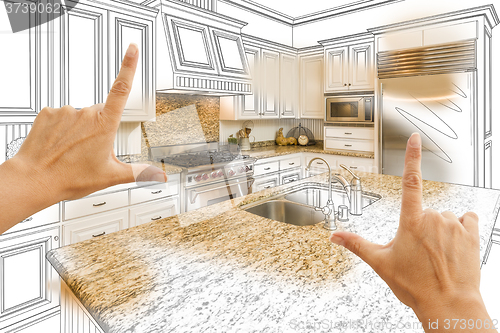 Image of Hands Framing Custom Kitchen Design Drawing and Photo Combinatio