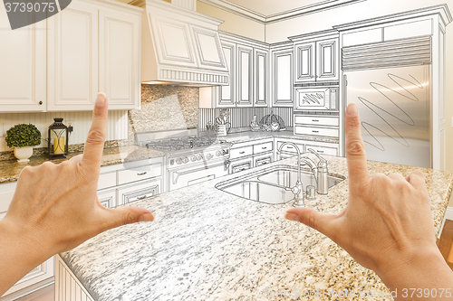 Image of Hands Framing Gradated Custom Kitchen Design Drawing and Photo C