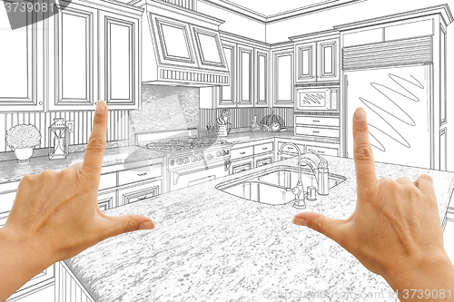 Image of Hands Framing Custom Kitchen Design Drawing